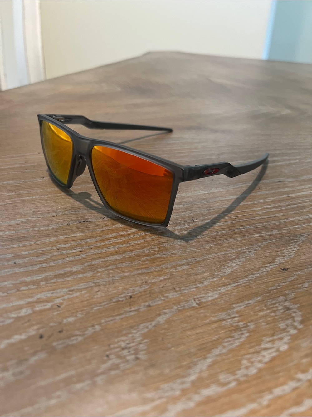 Men's Oakley Sunglasses with Orange-Mirrored Lenses